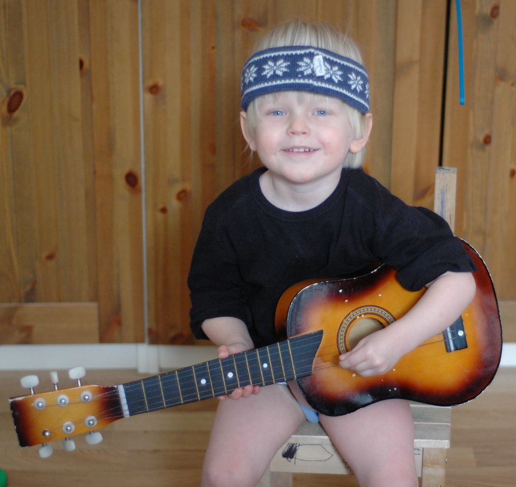 Dylan playing guitar